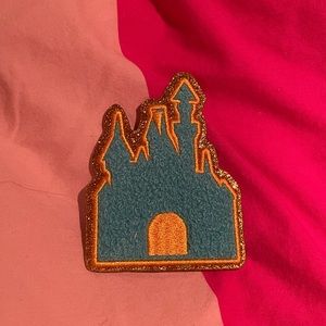 Castle iron on patch with gold trim